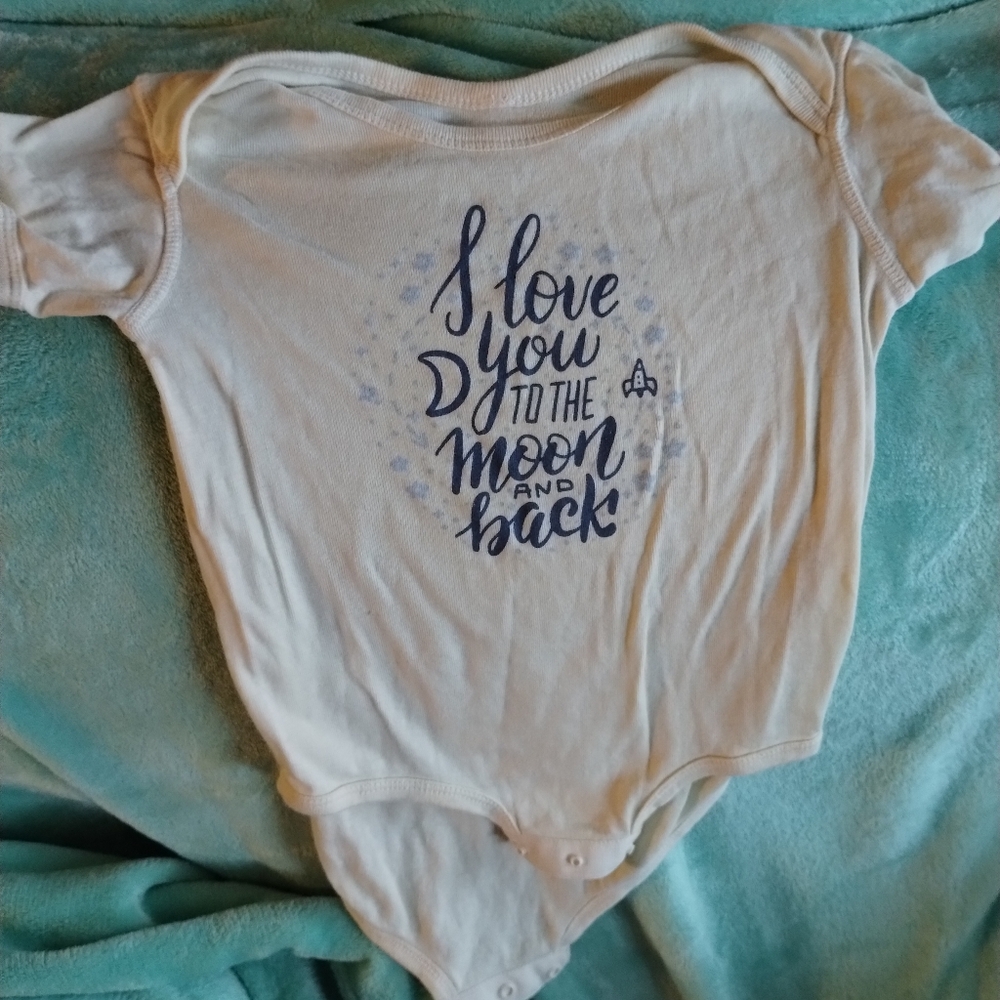 Wanderling Cream Onesie with Blue Accents